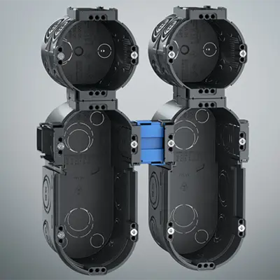 Double-row combination with the two-gang Junction box (Art. No. 1656-05) and one-gang junction boxes (Art.No. 1556-05) with distance supports (Art. No. 1159-35)...