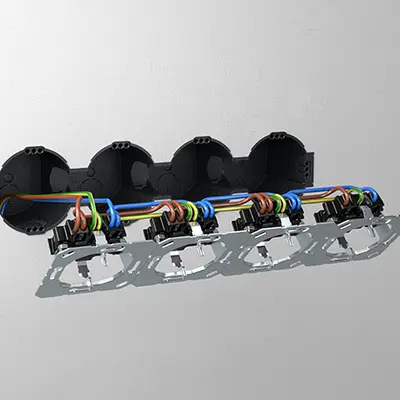 This makes it possible to insert the connecting cables of pre-wired accessories, such as sockets, quickly and easily without having to connect them in the sockets first.