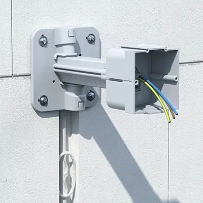 Push the one-gang box onto the supporting arm as far as the stop.