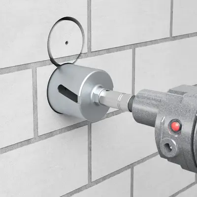 Fit diamond grinding head and drill holes at Ø 68 mm or Ø 82 mm.