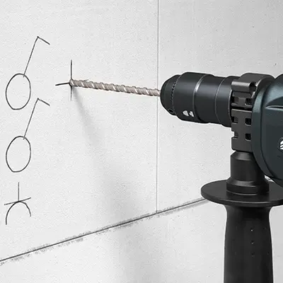 Drill the first hole Ø 6 mm at the intended position.
