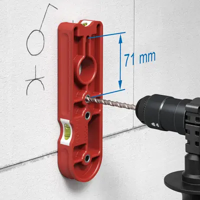 Pre-drilling. Create centering hole at a combination distance for multiple boxes using drilling template.