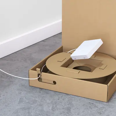 A la fin, sortir le raccordement d'abonné du carton et tirer le reste de la conduite.