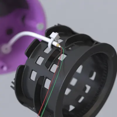 Déposer les fibres optiques sur le tambour de gestion des fibres.