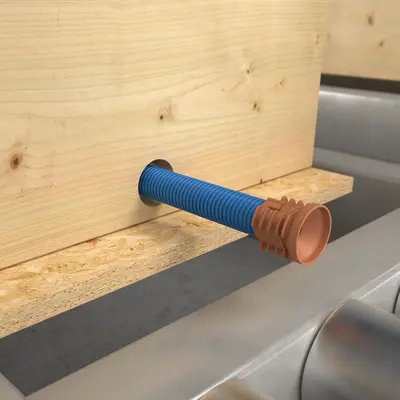 Push a conduit through the hole from the rear and “click” it into the junction element so that it is held in place.