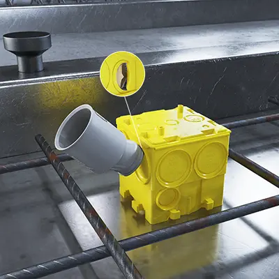 Push the nose of the conduit transition coupling at the marking of the box and turn it with pressure against the B² one-gang junction box until the feed-through is cut out.