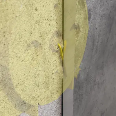 Het signaalborsteltje op de frontgedeelten van de Flat 45-systeemdozen hecht zich bij het weghalen van de bekisting hieraan vast en houdt de positie hiervan zichtbaar in het wandoppervlak.