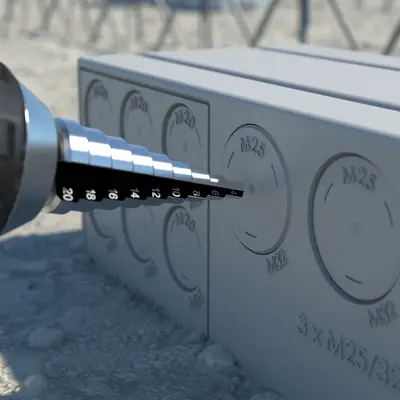 The required conduit entries can be opened with the KAISER step drill (Art. No. 1284-32)...