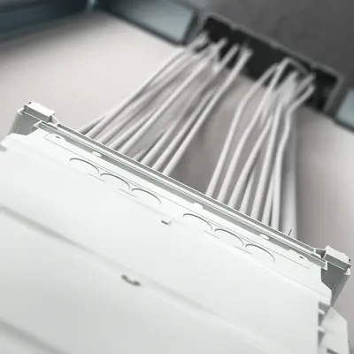 The central transition casing for the exit of several conduits, e.g. is located in above in the lightweight wall...