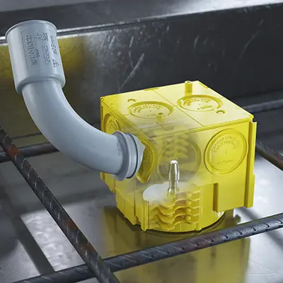 Insert the tips of the conduit connector into the desired conduit entry...