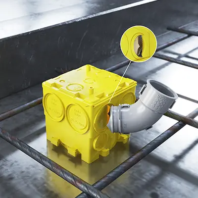 Pierce the tip of the 60° conduit connector at the desired conduit entry and turn until the feed-through is cut out.