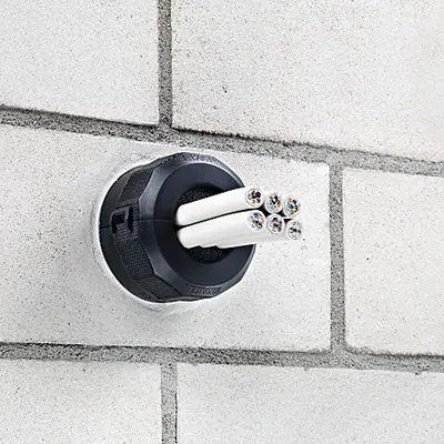 Placer le joint d'étanchéité sur le cylindre de cloisonnement et le fixer en tournant d'1/4 (fermeture baïonnette).