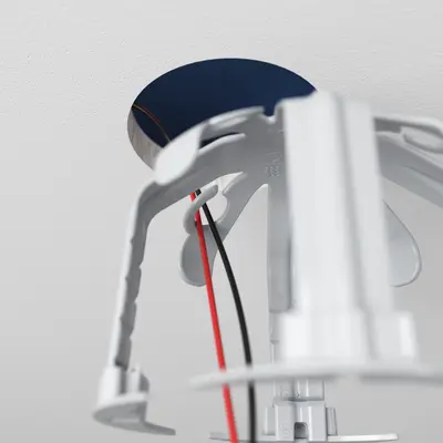 Four loops for secure cable routing.