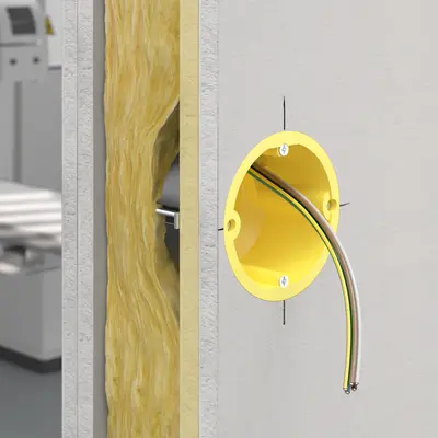 Inbouw van de stralingsbeschermingsdoos in de wand.