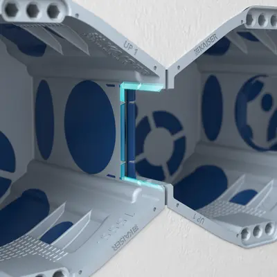 Moreover, in the case of permanently installed boxes, it is possible to break out the separator wall between the combined boxes in the upper area simply with a pair of combination pliers by means of a tilting movement...