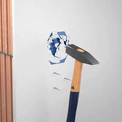 Opening the boxes with a blow of the hammer.
